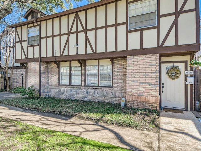 view of tudor-style house