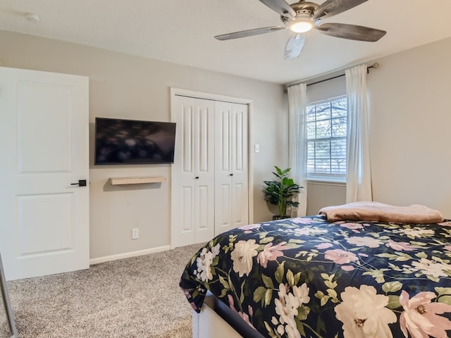 bedroom featuring a closet, ceiling fan, and carpet floors