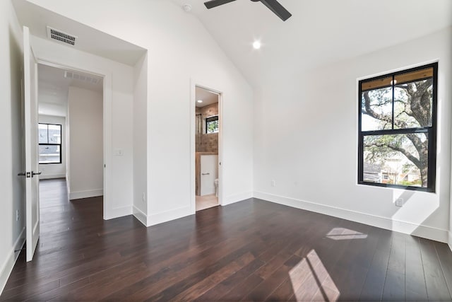 unfurnished room with vaulted ceiling, ceiling fan, and dark hardwood / wood-style floors