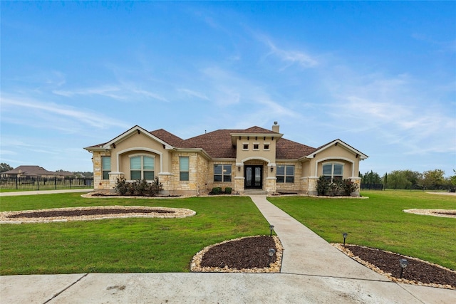 view of front facade with a front yard