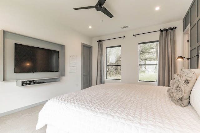 carpeted bedroom with ceiling fan