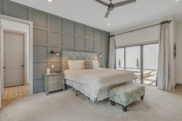 bedroom with light colored carpet, access to exterior, and ceiling fan