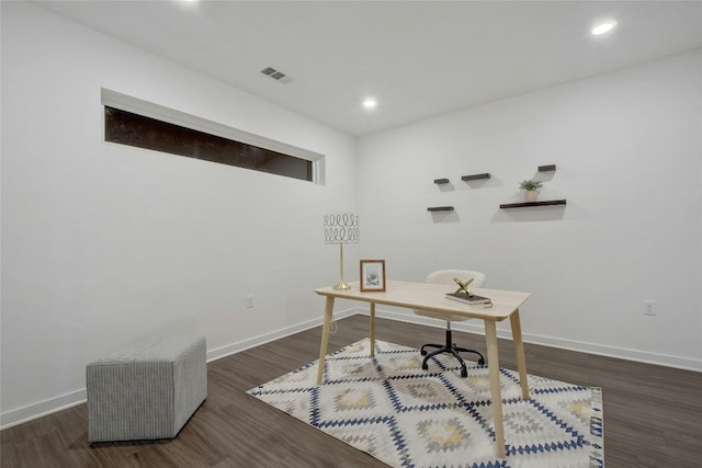 office with dark hardwood / wood-style floors