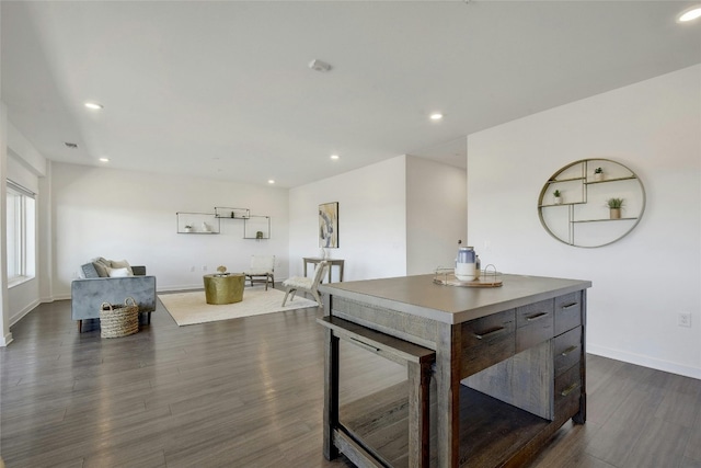 4361 S Congress Ave Unit 408, Austin, TX 78745 - kitchen featuring a center island, dark wood-style floors, recessed lighting, baseboards, and modern cabinets