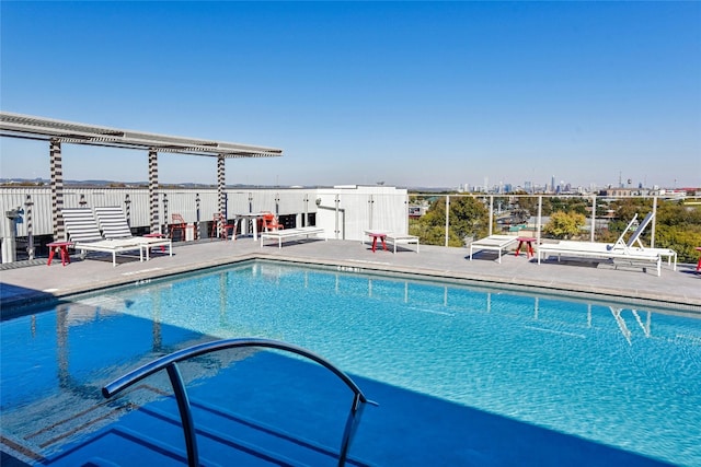 view of pool featuring a patio area