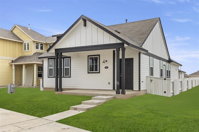 view of front of house featuring a porch and a front yard