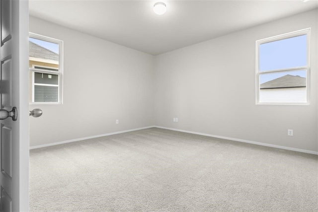 empty room featuring carpet floors