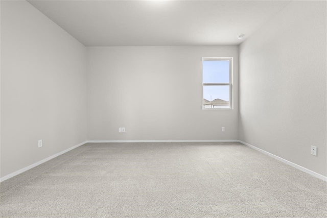 unfurnished room with carpet