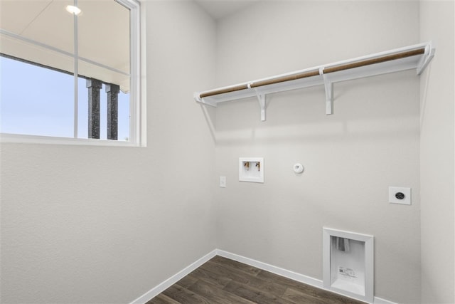 laundry area with hookup for an electric dryer, washer hookup, gas dryer hookup, and dark wood-type flooring