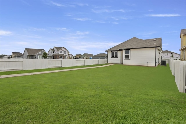 view of yard featuring central AC