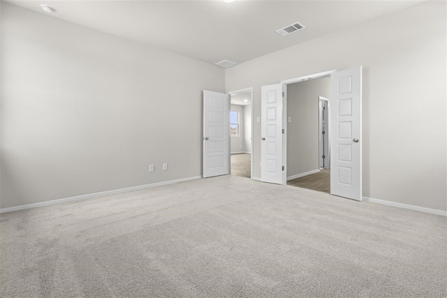 unfurnished bedroom featuring carpet