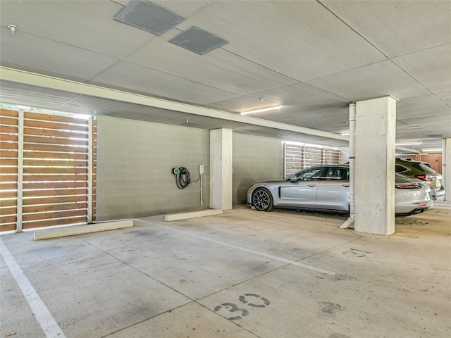 garage featuring a carport