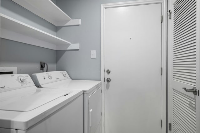 laundry room with washer and dryer and hookup for an electric dryer