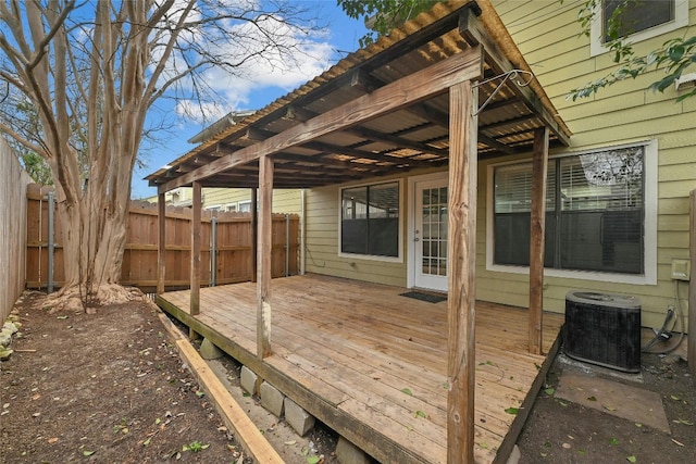 wooden deck featuring central air condition unit