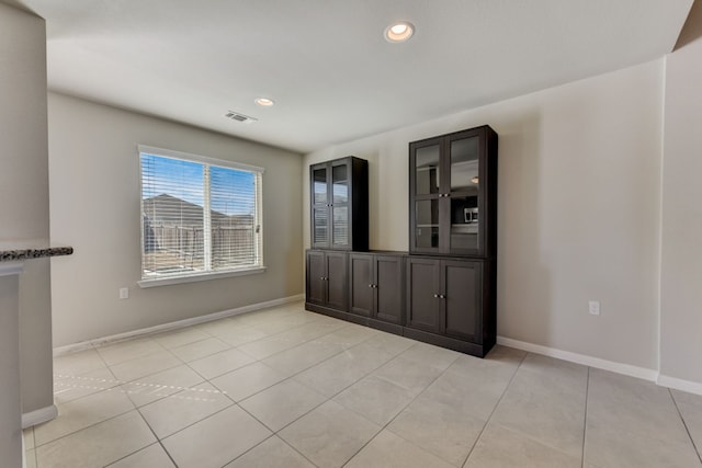 view of tiled spare room