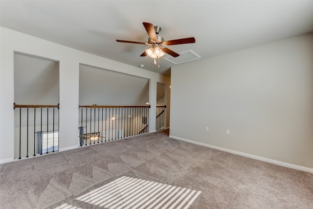 unfurnished room featuring light carpet and ceiling fan