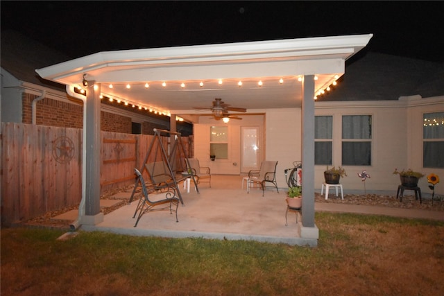 patio at twilight with ceiling fan