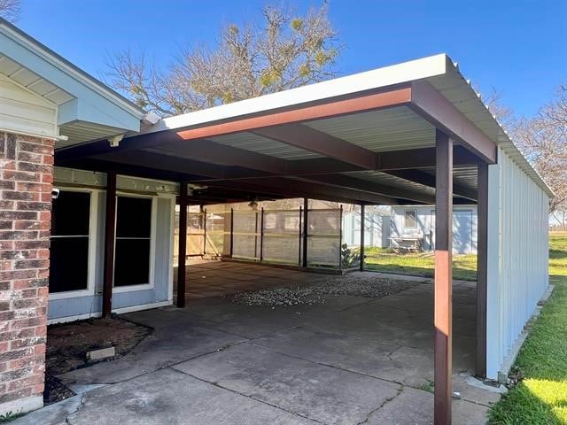 view of car parking featuring a carport