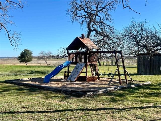 view of play area featuring a yard