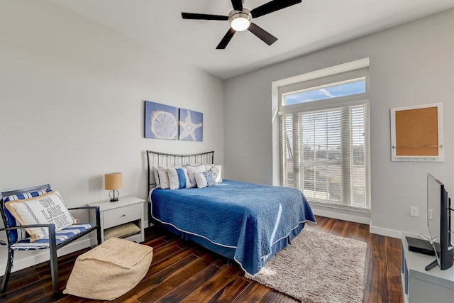 2918 Ranch Road 620 N Unit S-242, Austin, TX 78734 - bedroom featuring baseboards, ceiling fan, and wood finished floors