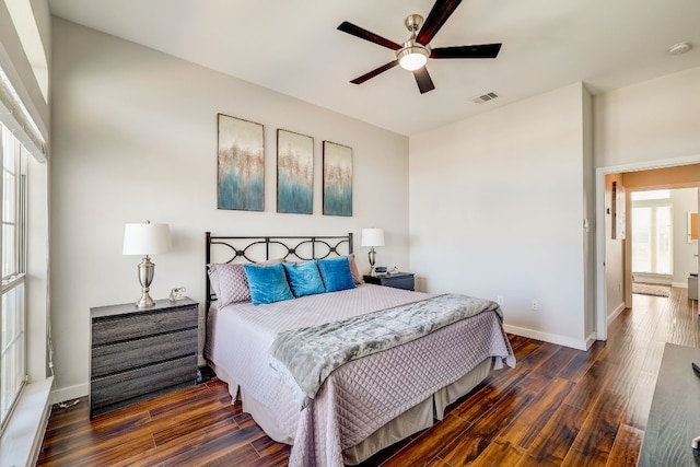 2918 Ranch Road 620 N Unit S-242, Austin, TX 78734 - bedroom featuring ceiling fan, baseboards, visible vents, and wood finished floors