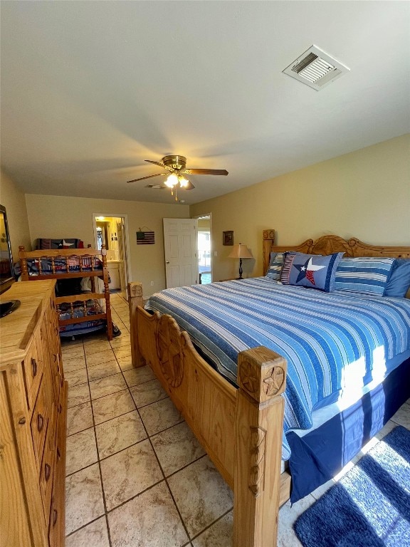 bedroom featuring ceiling fan and light tile patterned flooring