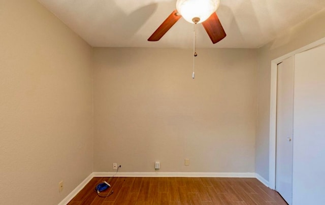 spare room featuring ceiling fan and light wood-type flooring