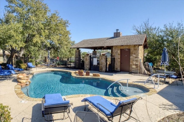 view of pool featuring a patio area