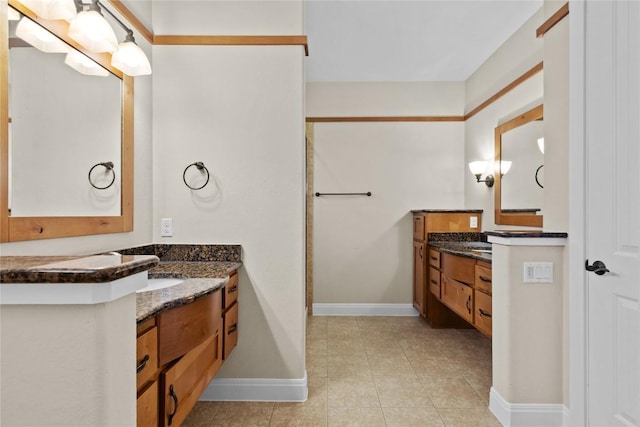 bathroom with vanity and tile patterned floors