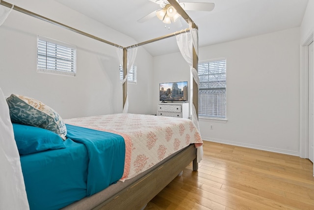 bedroom featuring ceiling fan and light hardwood / wood-style floors