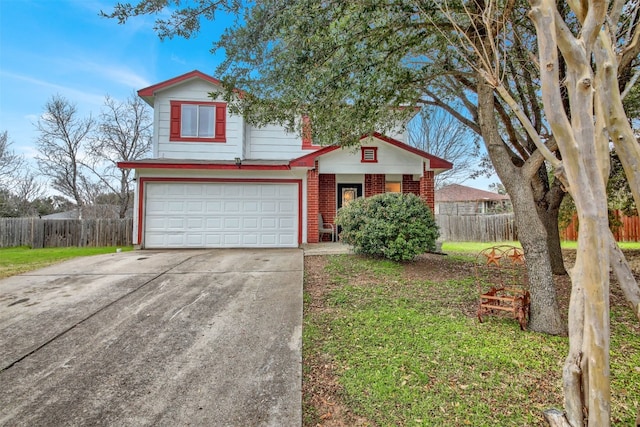 view of front of home with a garage and a front yard