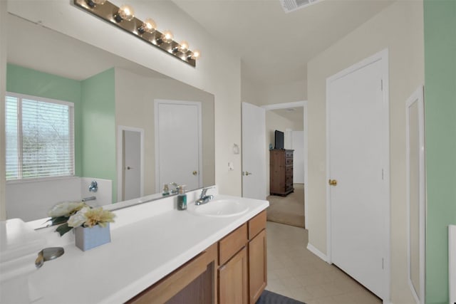 bathroom featuring vanity and tile patterned floors