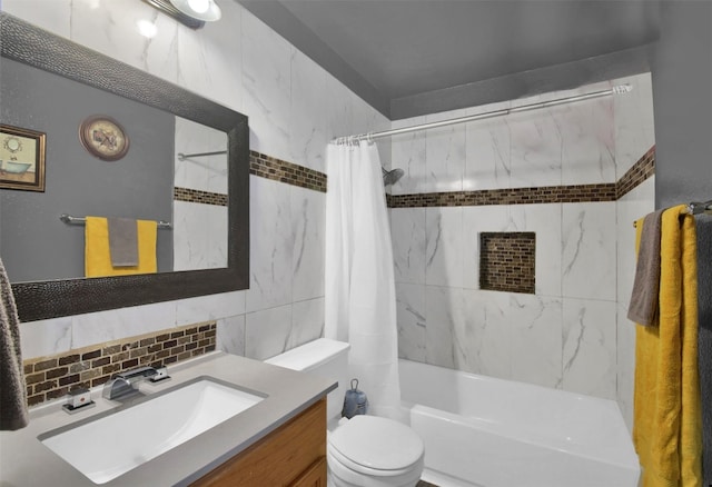 full bathroom featuring tasteful backsplash, toilet, vanity, tile walls, and shower / bath combo with shower curtain