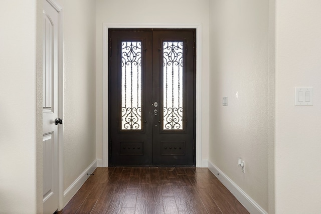 foyer with french doors and dark wood-type flooring