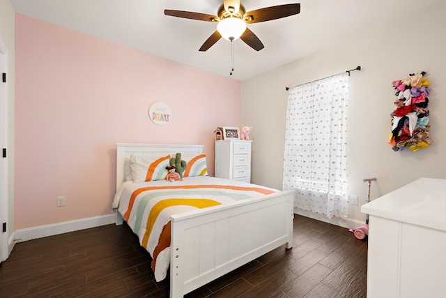 bedroom featuring ceiling fan and dark wood-type flooring