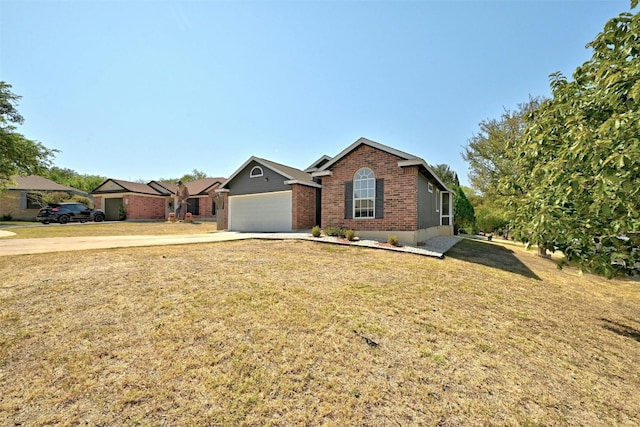 single story home featuring a front lawn and a garage