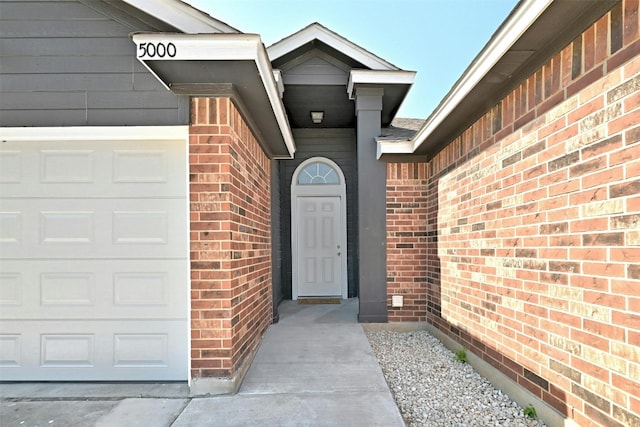 property entrance featuring a garage