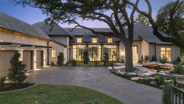 view of front of home with a garage