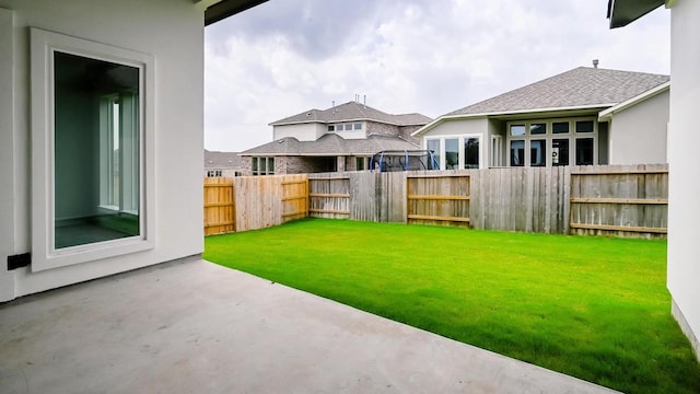 view of yard with a patio area