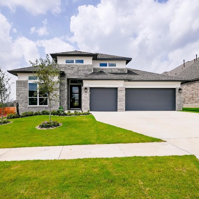 prairie-style house with a front lawn