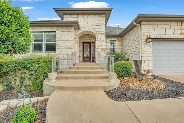 property entrance featuring a garage