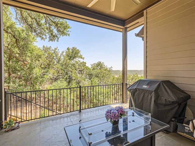 view of patio featuring ceiling fan and grilling area