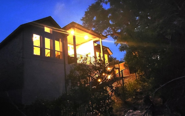 view of property exterior at twilight