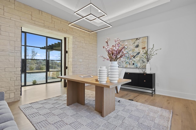 home office with light wood-type flooring