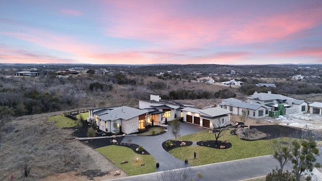 view of aerial view at dusk