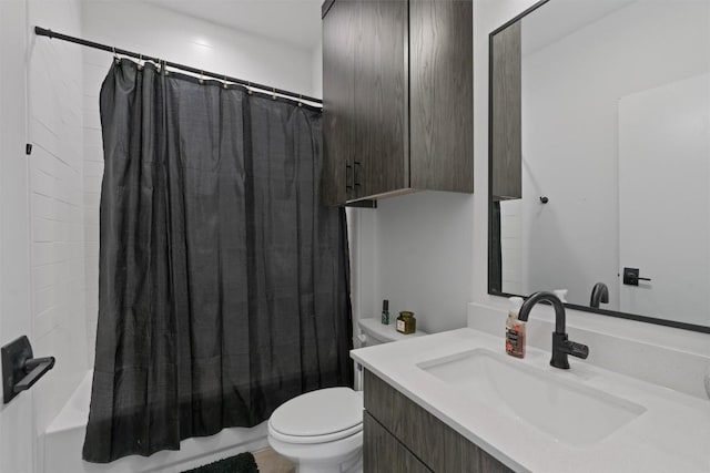 full bathroom featuring vanity, toilet, and shower / tub combo