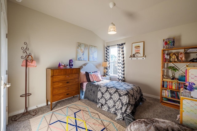 carpeted bedroom featuring vaulted ceiling