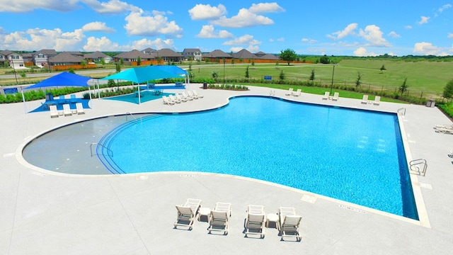 view of pool with a patio