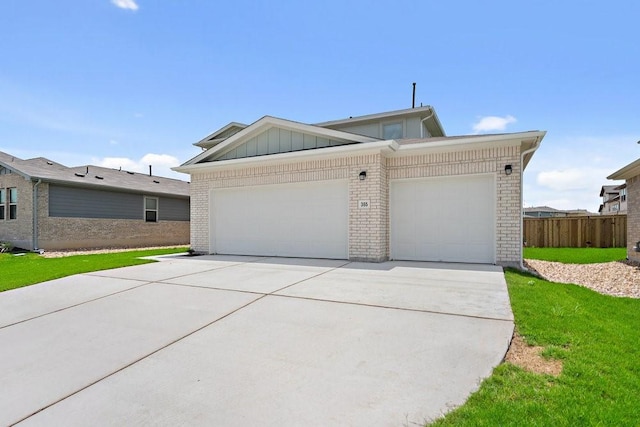 single story home with a garage and a front lawn