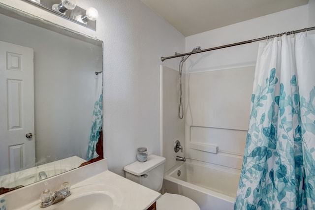 full bathroom featuring toilet, shower / tub combo, and vanity